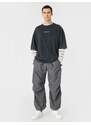 Koton Parachute Trousers with a loose fit, lacing at the waist, and elasticated legs with a pocket detail.