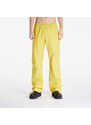 Pánské šusťákové kalhoty Nike x NOCTA x L'ART DE L’AUTOMOBILE Men's Tech Pants Vivid Sulfur/ Sail